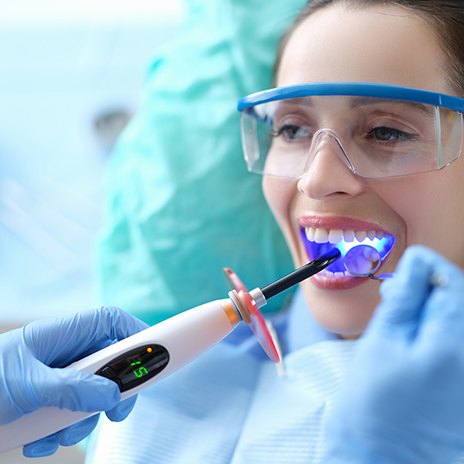 A woman getting cosmetic dental bonding