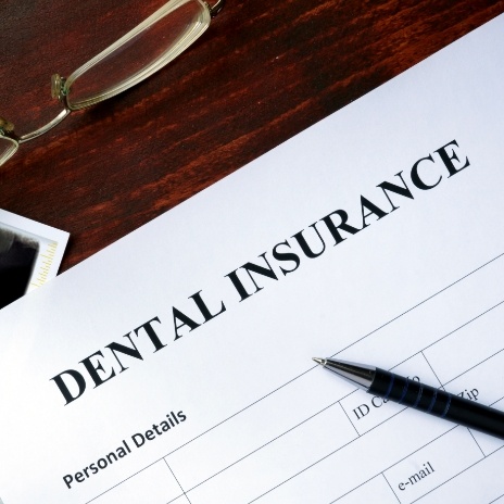 Dental insurance form on desk