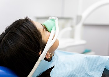 Woman relaxing in treatment chair