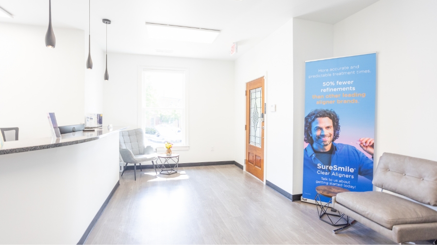 Pristine white reception area in Alpharetta dental office