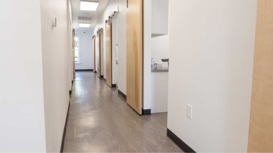 Hallway leading to dental treatment rooms